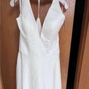 David’s Bridal NWT.  Satin fabric, Ivory/white.  Size 12.  Has not been altered.